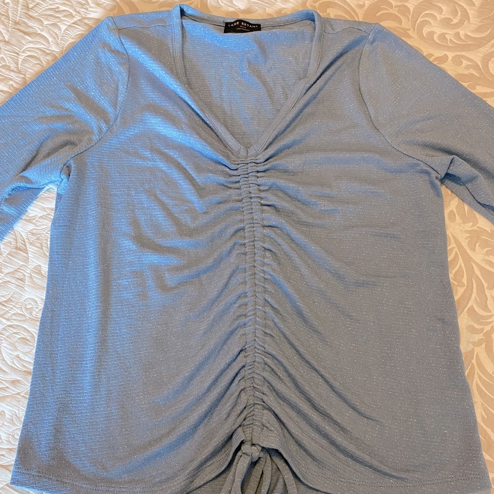 Lane Bryant top.14/16 Baby blue with glitter.V-neck with tie bottom front.